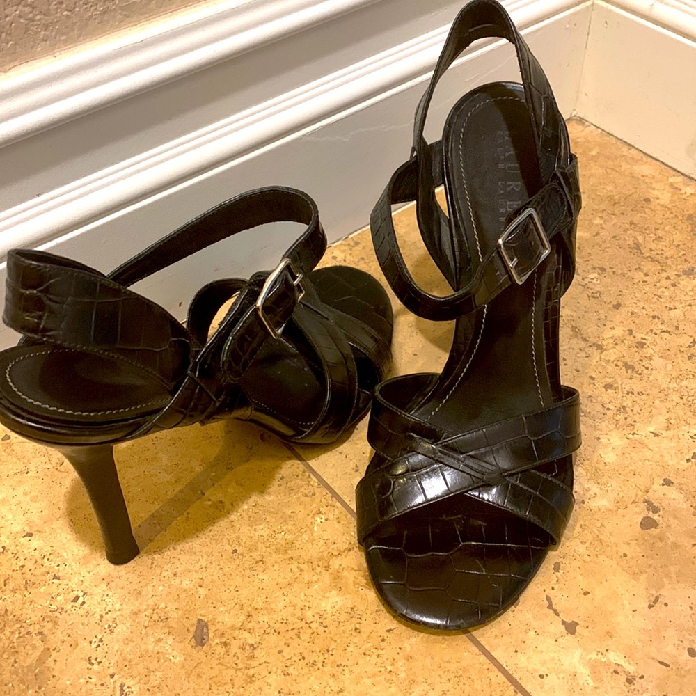 Black leather heel with ankle strap.